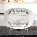 Personalized oval Our Family Recipe platter with vintage rose florals and custom recipe lines pairing family names with qualities such as patience and laughter.
